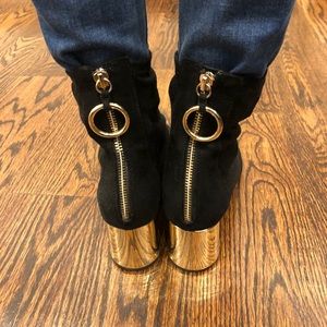 Black ankle booties with gold details